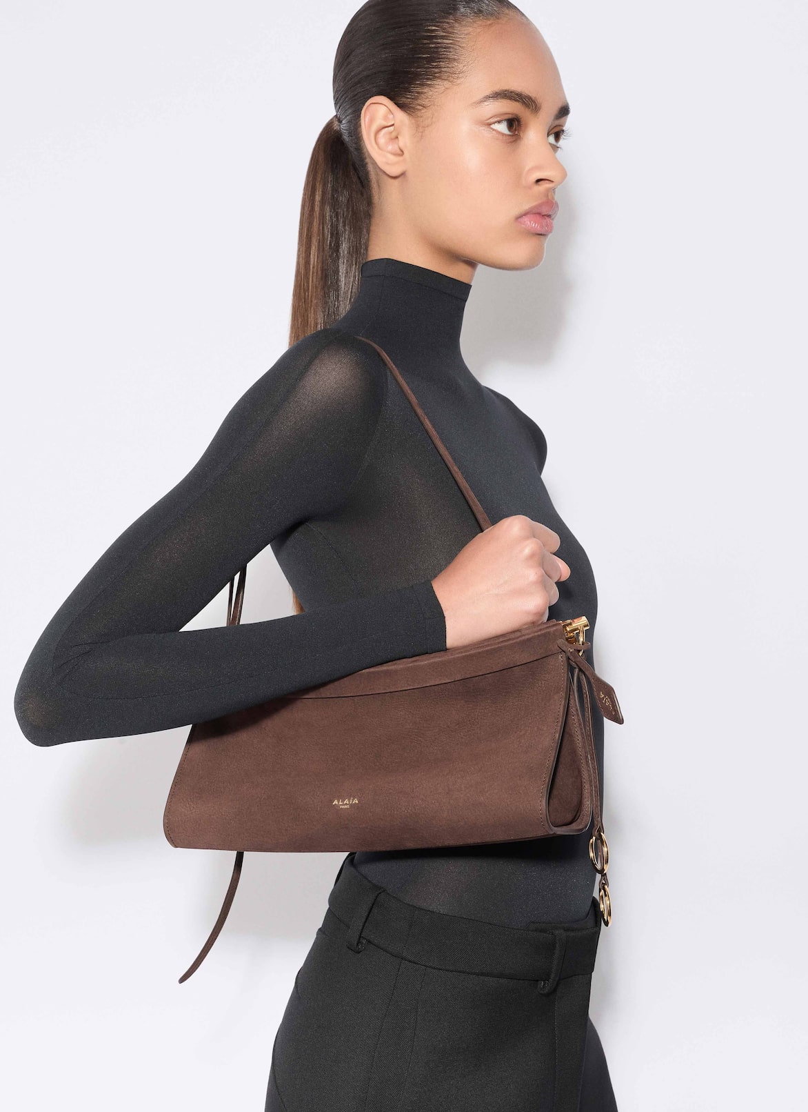 LE CLICK EAST WEST MEDIUM BAG IN NUBUCK ALAÏA DARK BROWN LE CLICK EAST WEST MEDIUM BAG IN NUBUCK